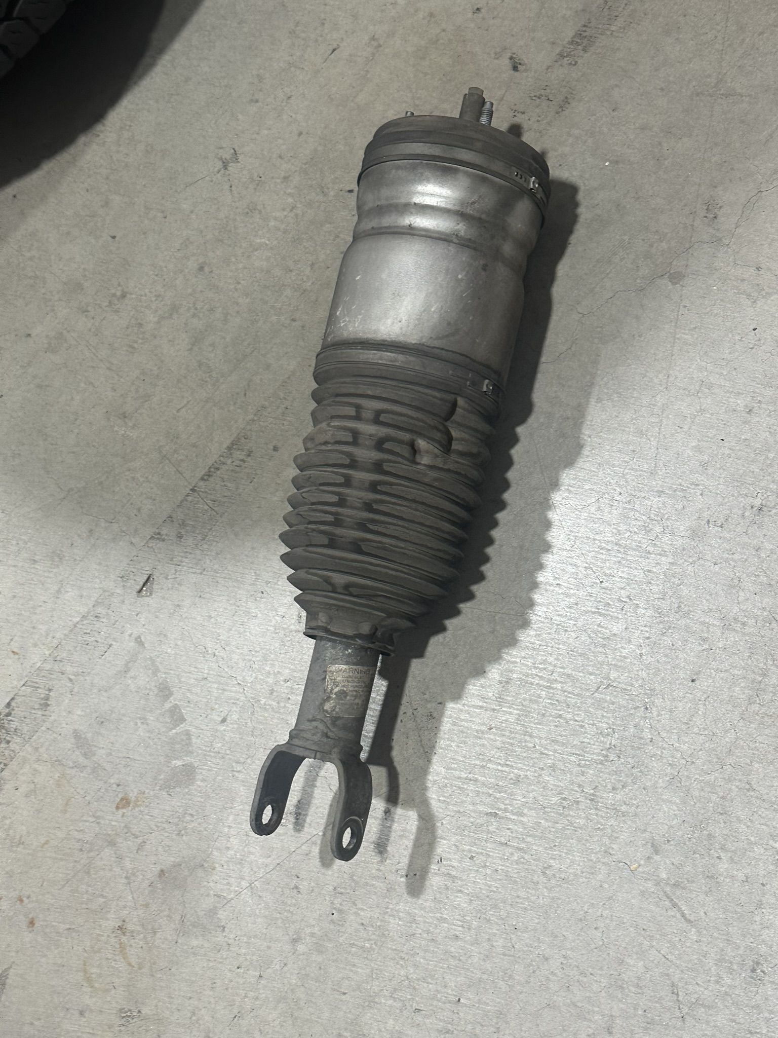 Removed factory air suspension strut from the 2014 Ram 1500