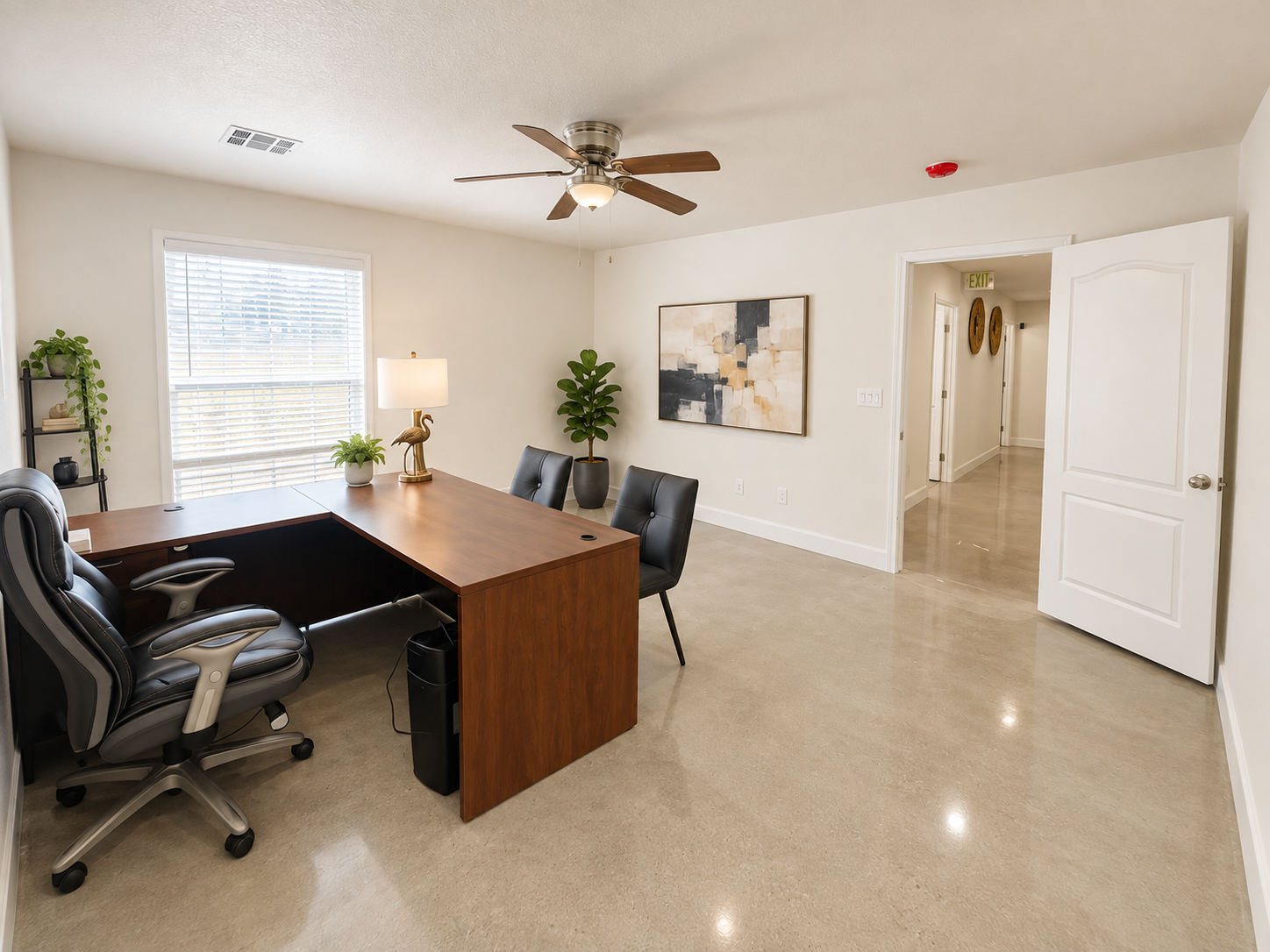 Desk-side view with a clear connection to the hallway