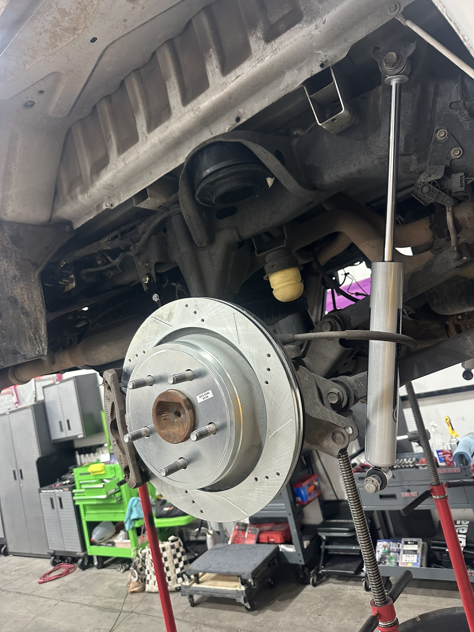 PowerStop rear brake rotor and new shock installed on the Ram 1500