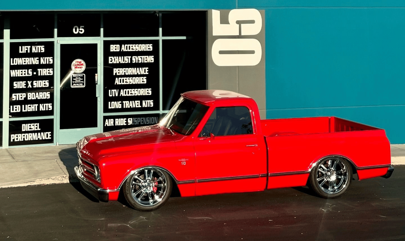 Custom red classic pickup truck outside The Custom Shop LV in Las Vegas
