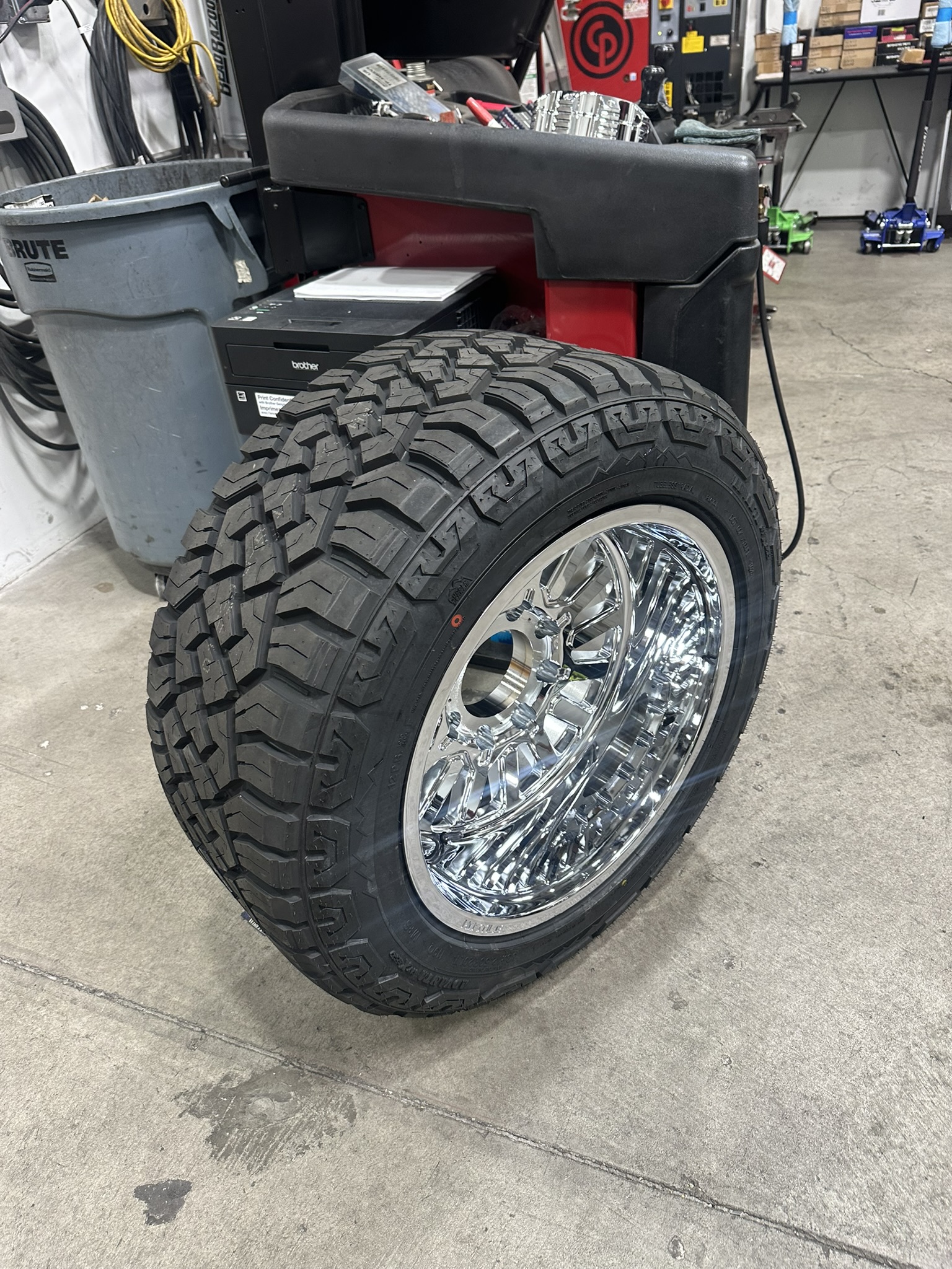 Chrome Edge wheel and Nitto tire prepared for the Ram 1500