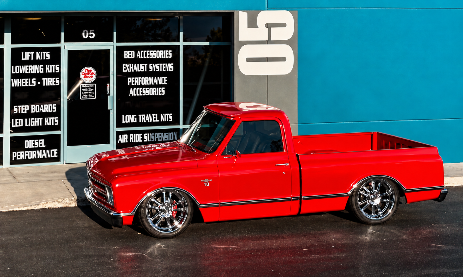 Custom red classic pickup truck outside The Custom Shop LV in Las Vegas